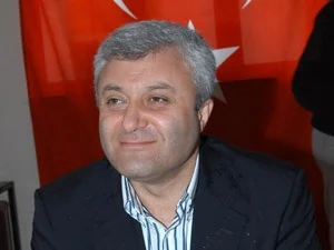 Bahçeli'den Tuncay Özkan'a hakaret cezası
