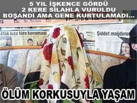 Ölüm korkusundan yüzünü gizliyor