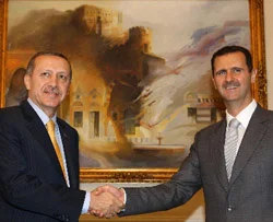 Başbakan Beşşar Esad'la görüşüyor