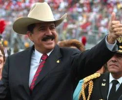 Honduras'ta Zelaya görevine döndü