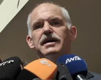 Seçimi kaybeden Karamanlis'ten istifa