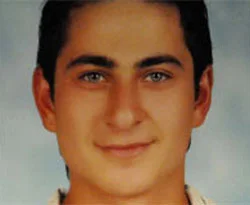 Şehit askerin ardında fotoğrafı kaldı