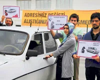 'Kontağı çevirmeden başörtünüzü açınız'