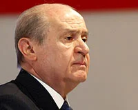 Bahçeli: Darbeciler ordudan temizlenmeli