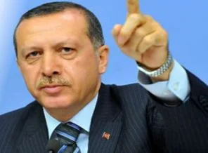 Erdoğan: Başörtüsü yasağı ilkelliktir