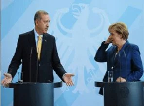 Erdoğan'dan Merkel'e iki uyarı