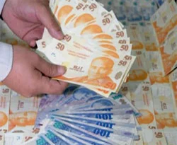 Sahte paraları mezarda saklamışlar