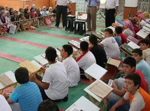 Kur'an kurslarını zevkle kapatmışlardı