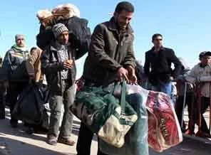 Kaddafi, göçmenlerin kaçmasını engelliyor