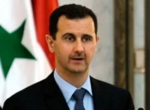 Suriyeli gençler Esad'ın resimlerini indiriyor