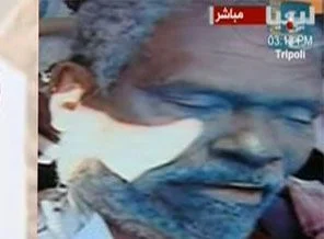 Kaddafi'nin öldürülen Bakanı'nın görüntüleri (video)