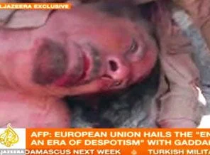Öldürülen Kaddafi'nin ilk görüntüleri (video)