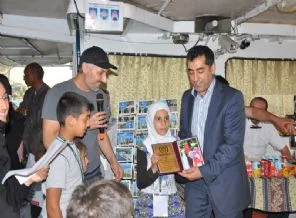 Suriyeli yetimlerden Timetürk'e ödül