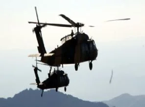 Suriye'de helikopter düşürüldü