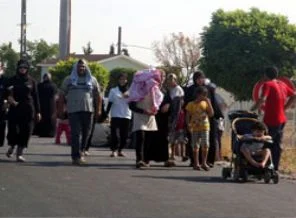 Irak'a kaçan Suriyeliler ülkelerine dönmek istiyor