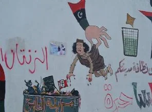 Karikatüristlerin gözünden Kaddafi'nin gidişi
