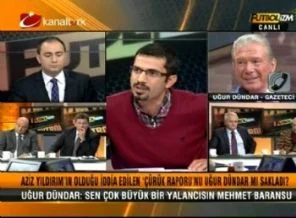 Dündar, Taraf yazarına canlı yayında saydırdı