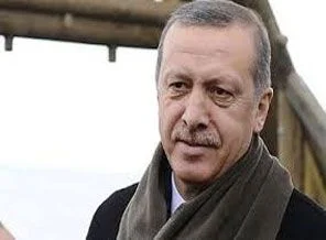 Erdoğan'dan anne ve babasının mezarını ziyaret