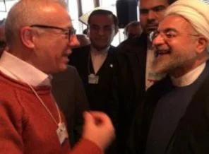 Ertuğrul Özkök Davos'ta Ruhani ile poz verdi