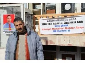 Ağrı'da muhtar adayından gülümseten slogan
