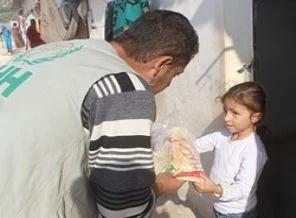 Suriyeli yetimlere 20 milyon ekmek