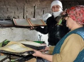 Küle dönen evde sadece Kur'an-ı Kerimler yanmadı
