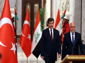 Davutoğlu'ndan İbadi'ye çağrı
