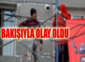 İşçinin eylemciye bakışı günün fotoğrafı oldu!