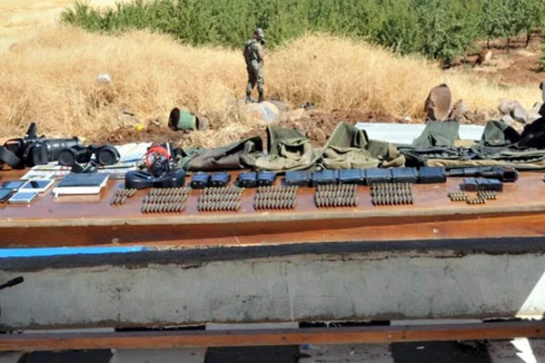 PKK'lı evlerinden cephanelik çıktı