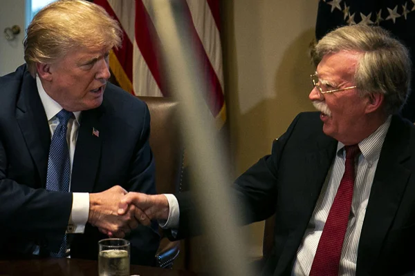 Trump: Bolton'a kalsa tüm dünyayla savaşıyor olurduk
