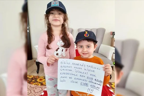 Görevdeki anne ve babalarını evde bekleyen çocuklardan 'evde kalın' çağrısı