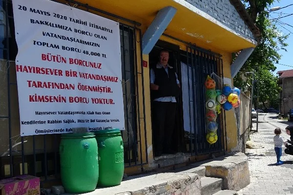 Gizemli hayırsever kadın, mahallelinin 20 yıllık veresiye borcunu kapattı