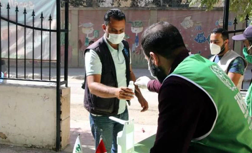 İHH, Afrin'de 10 bin maske ve el dezenfektanı dağıttı