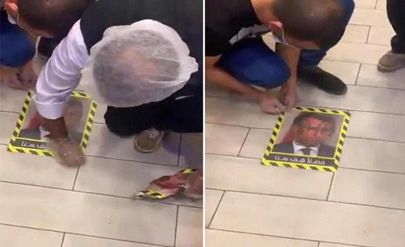 Macron'un fotoğrafı bir restoranın giriş zeminine yapıştırıldı