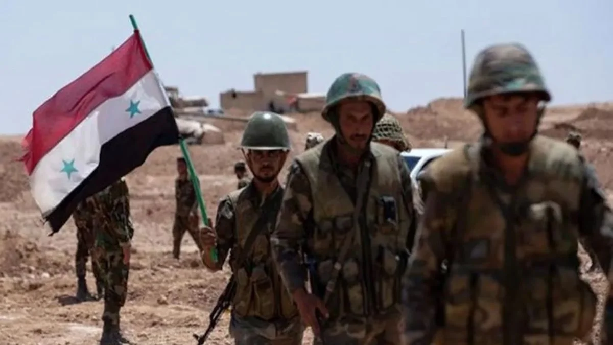 Esed rejiminin askerleri ellerinde bayraklarla PKK/YPG'ye destek için geldiler!