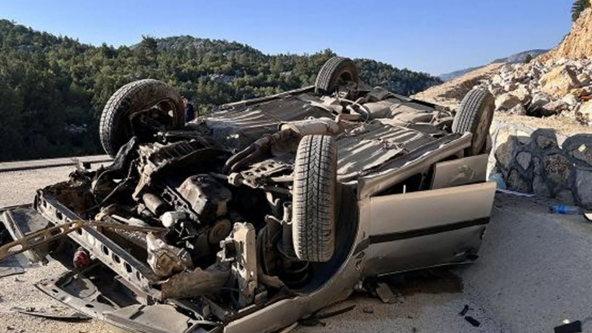 Takla atan otomobilden yara almadan kurtuldu